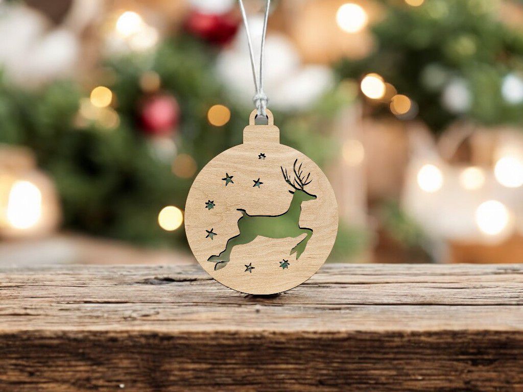 Laser Cut Reindeer with Stars Christmas Bauble Vector