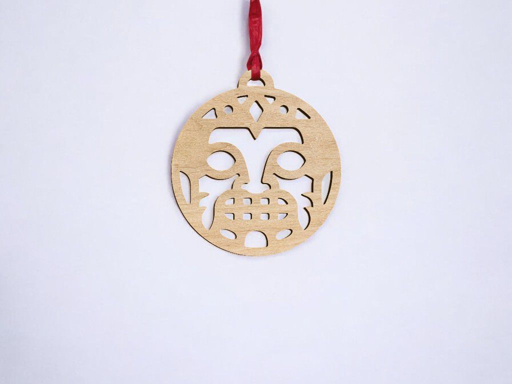 Laser Cut Tribal Face Christmas Ornament Vector