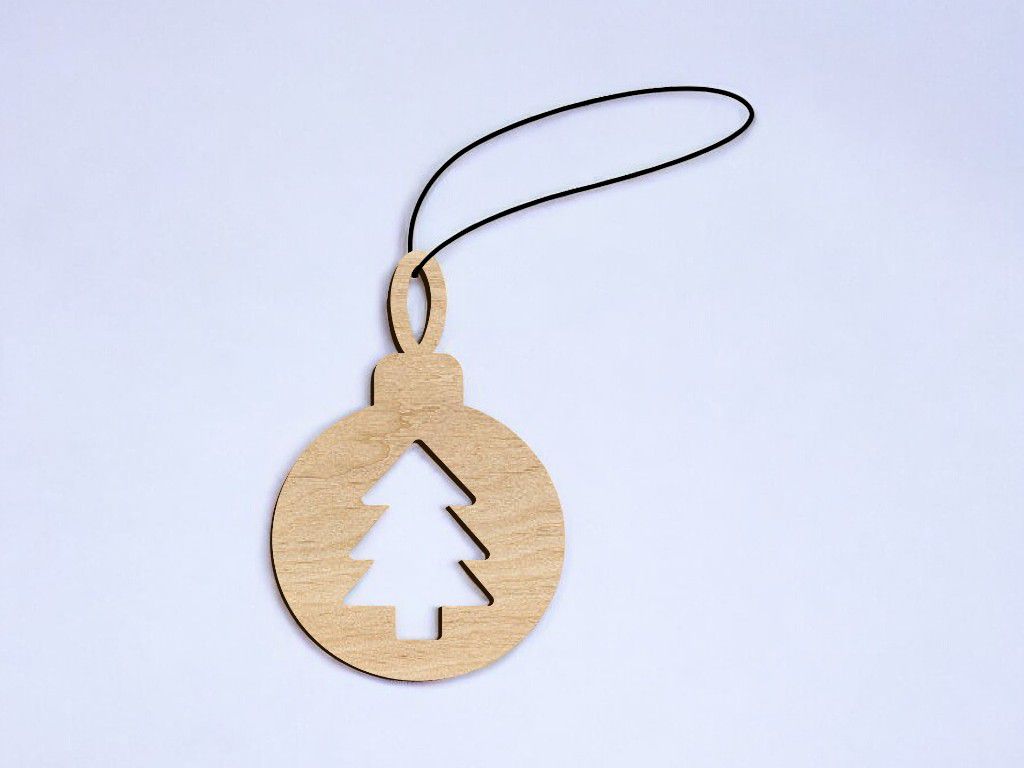 Laser Cut Bauble with Christmas Tree Shape Vector