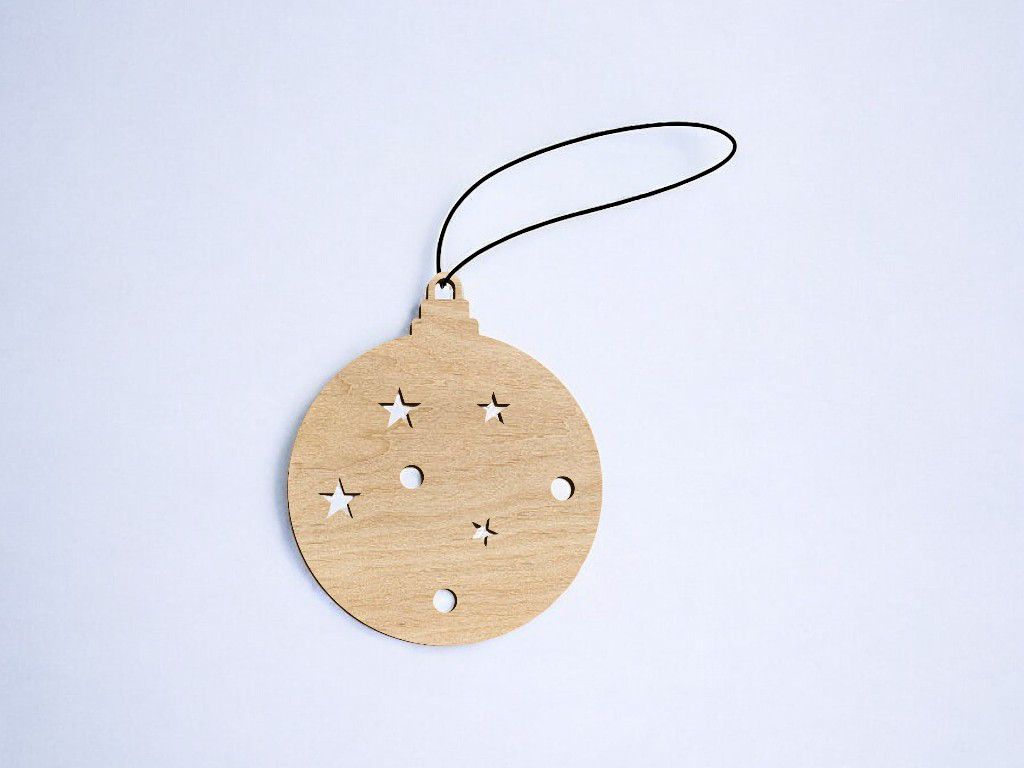 Laser Cut Christmas Ornament with Stars and Circles Vector