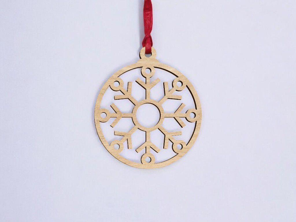 Laser Cut Christmas Decoration with Snowflake Vector