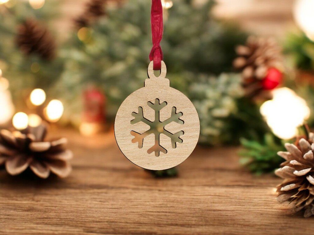 Laser Cut Christmas Bauble with Snowflake Cutout Vector