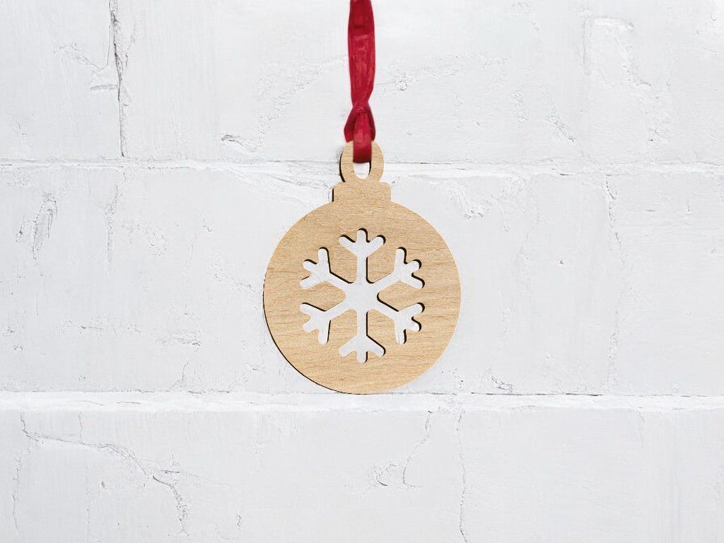 Laser Cut Christmas Bauble with Snowflake Cutout Vector