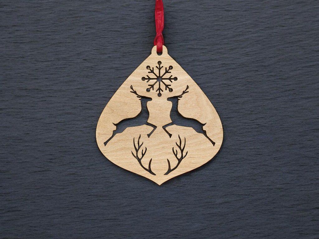 Laser Cut Ornament with Deer and Snowflake Vector