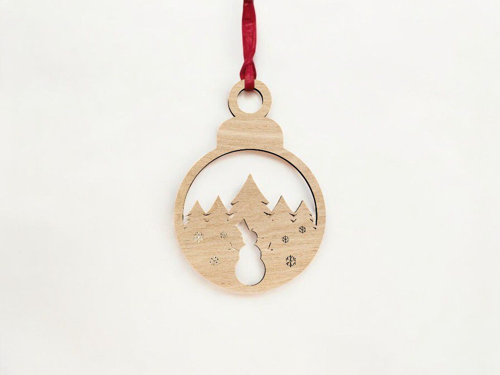 Laser Cut Christmas Ornament with Snowman and Trees Vector