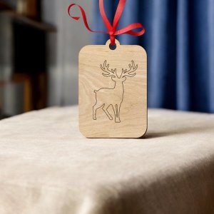 Laser Cut Reindeer Engraved Christmas Ornament Vector