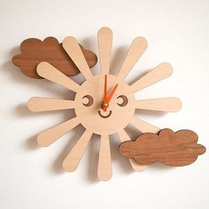 Laser Cut Sun and Clouds Wall Clock