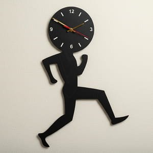 Laser Cut Uomino Running Man Wall Clock