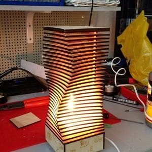 Laser Cut Wooden Table Lamp with Twisted Slat Design
